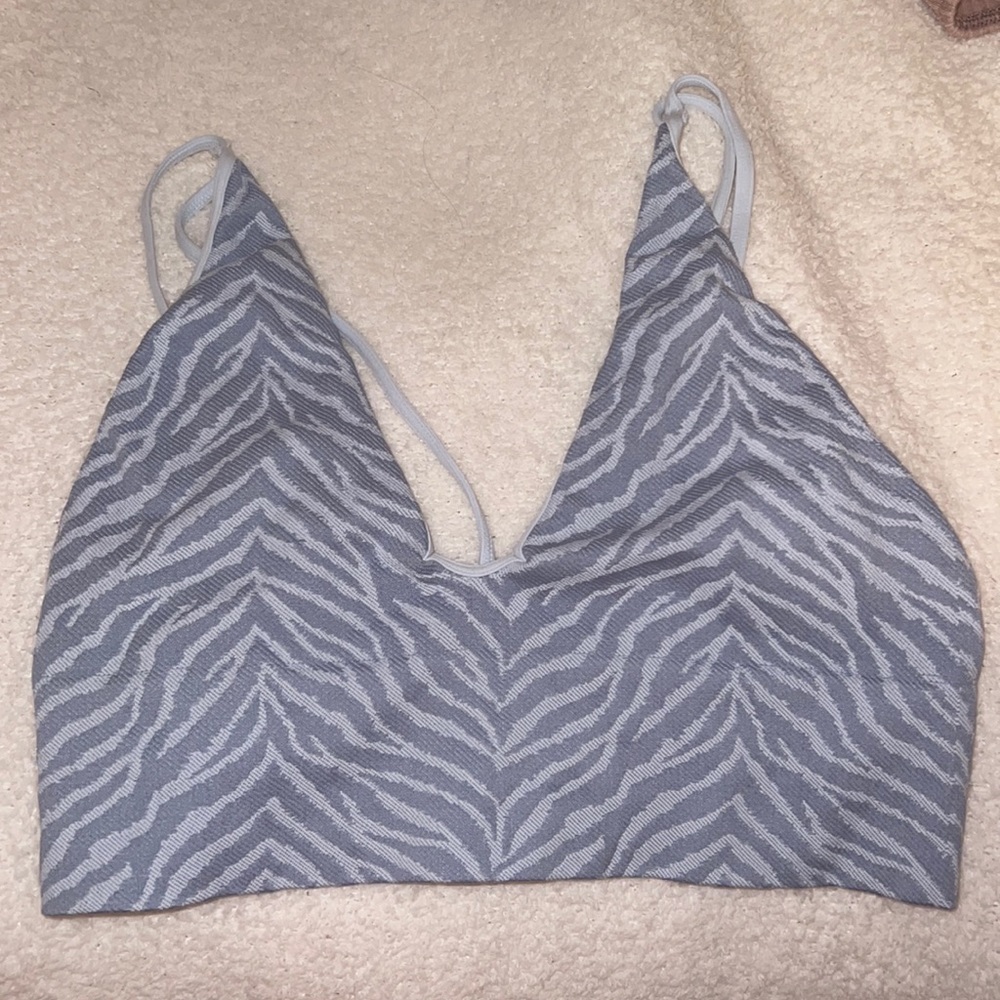 Blue zebra print tank top from Tilly’s.
